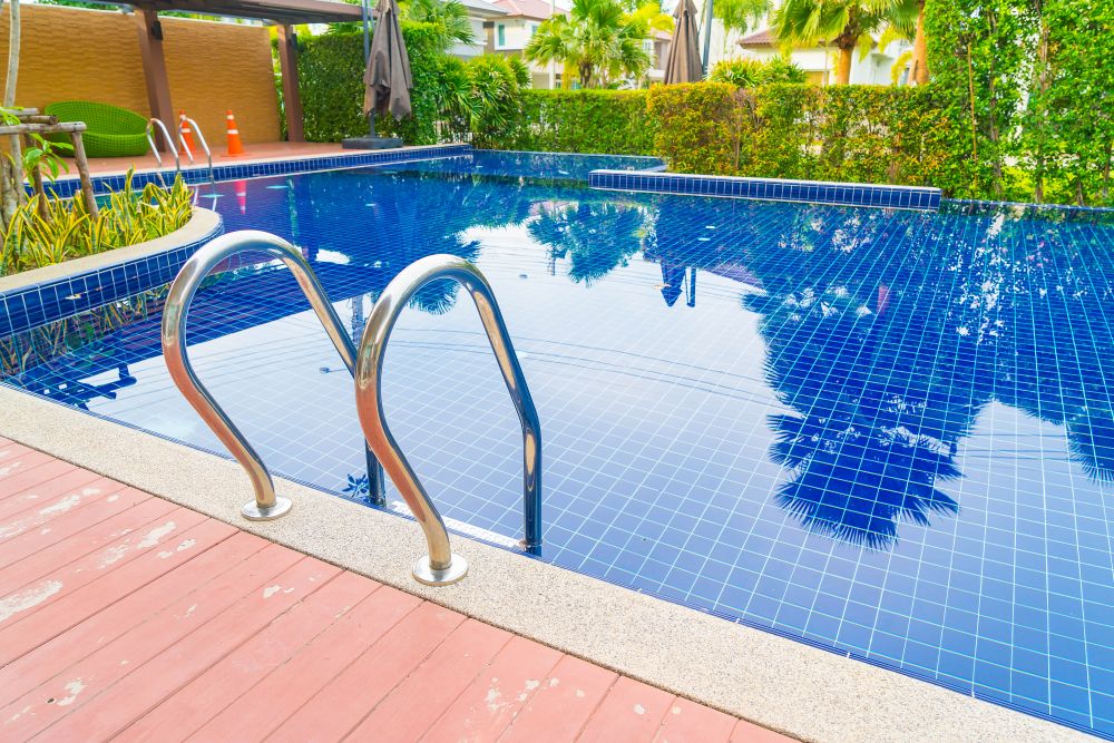 Stair swimming pool in beautiful luxury hotel pool resort - boost color up processing style